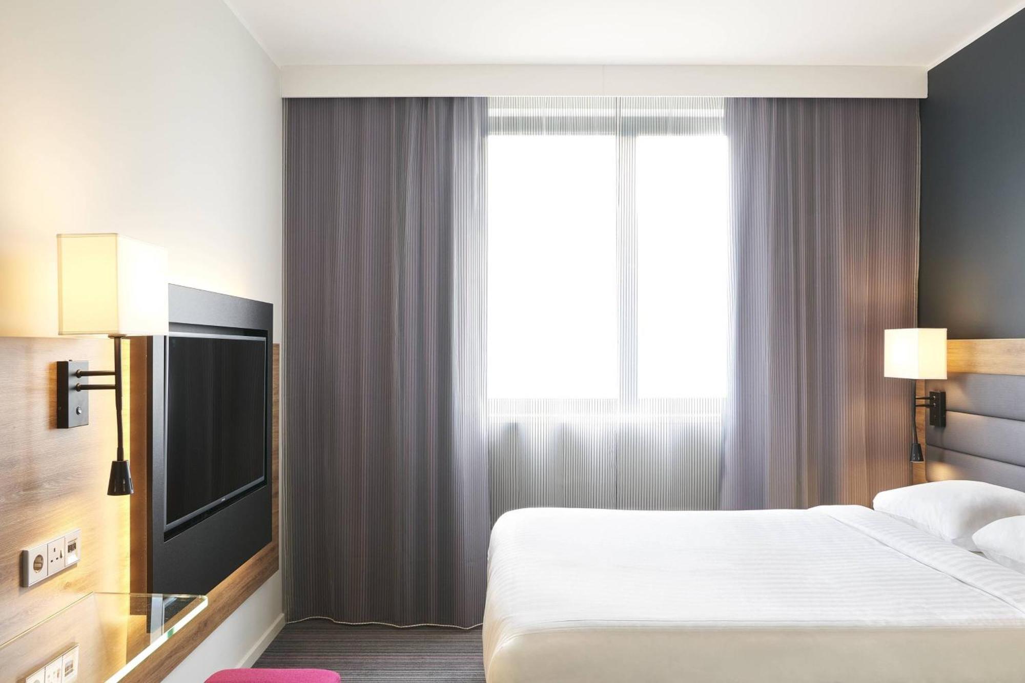 Hotel Moxy Munich Messe à Aschheim Extérieur photo